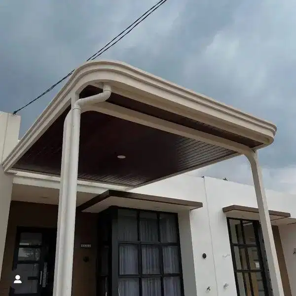 kanopi garasi atap melengkung minimalis