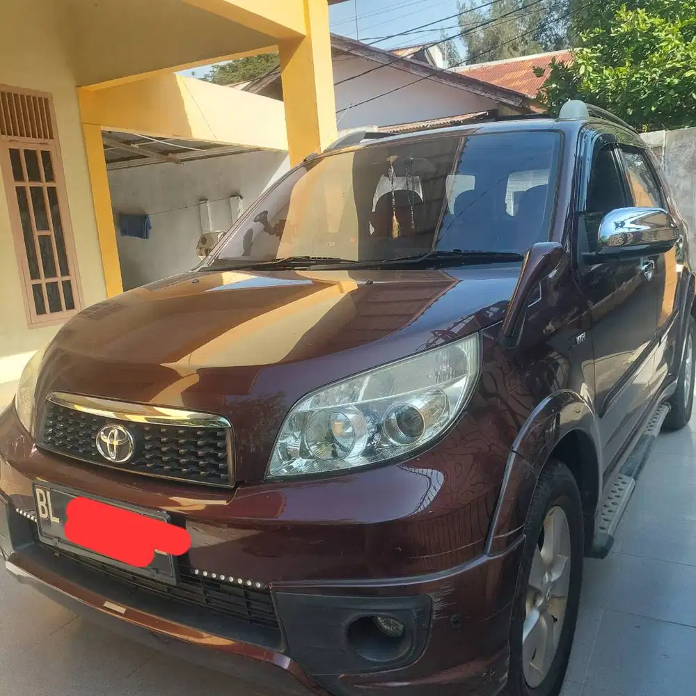 Jual Toyota Rush merah marun