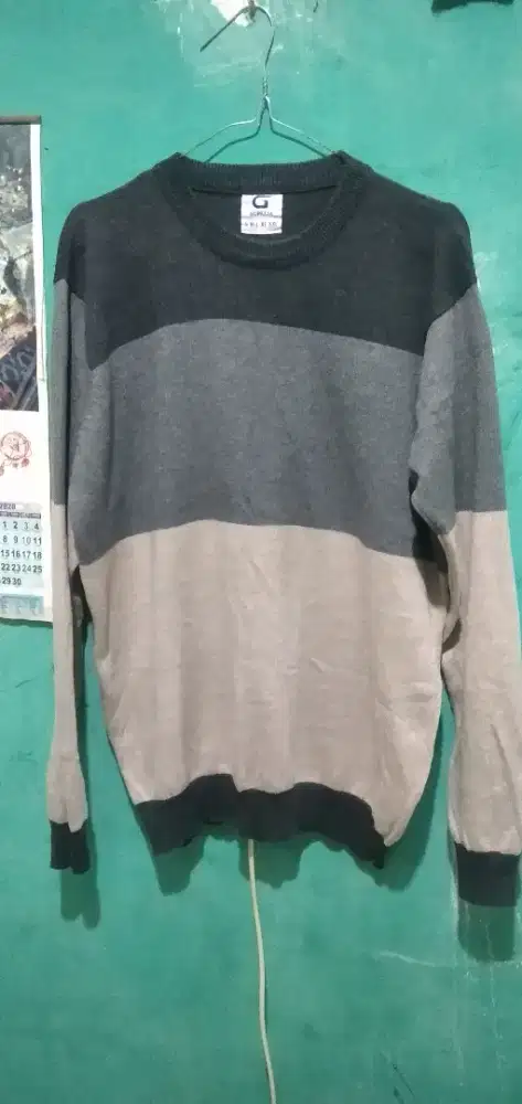Sweater rajut pria gomuda