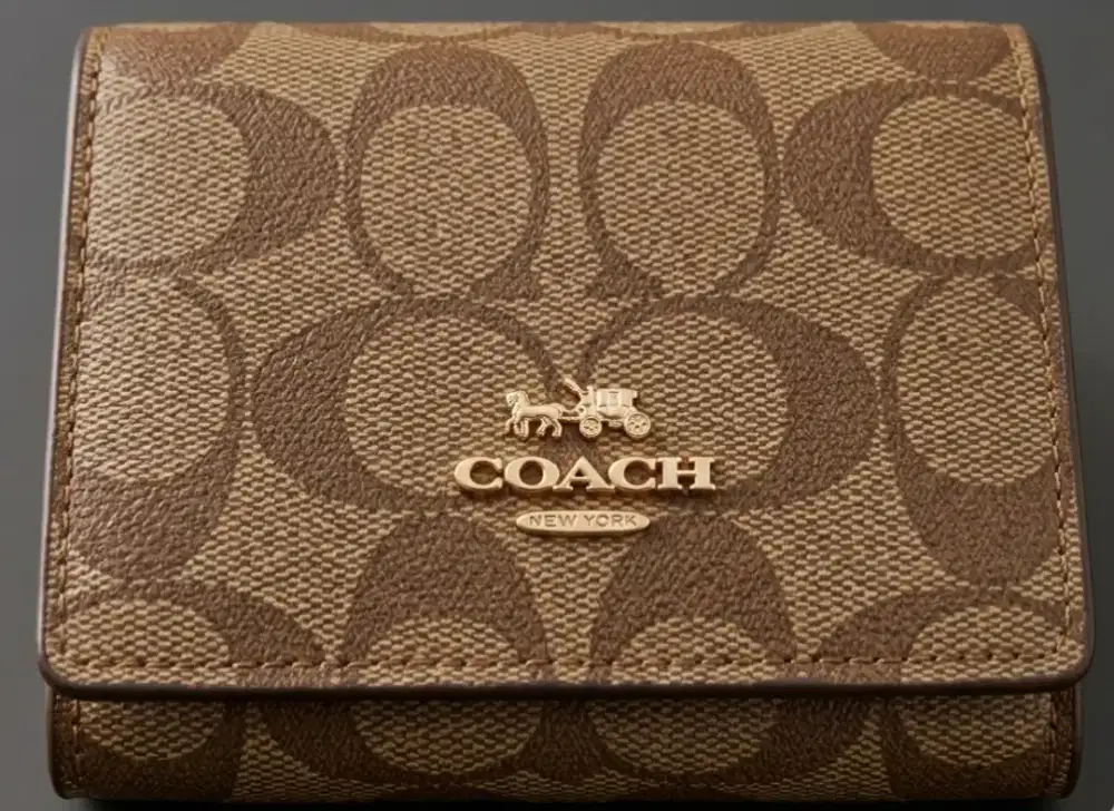 dompet coach khaki saddle