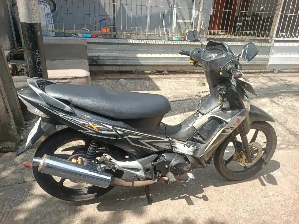 Honda supra 125 karbu tahun 2012