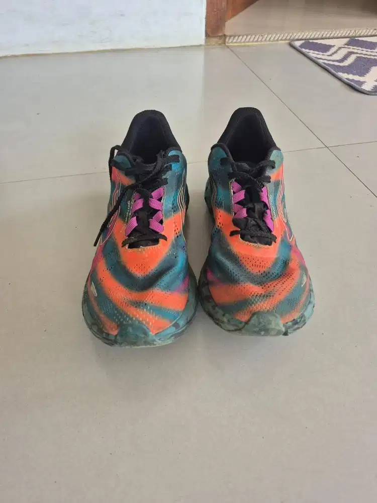 Sepatu lari merk nine ten