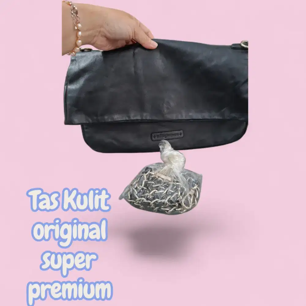 Tas lipat hitam kulit