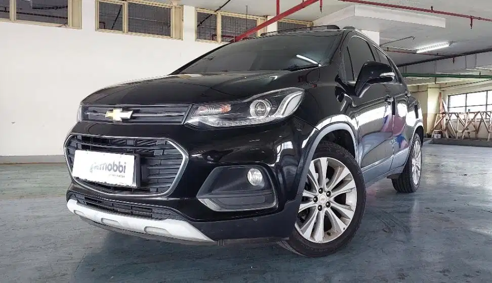 TDP 7,JT, Chevrolet Trax 1.4 Premier Bensin-AT Hitam 2018