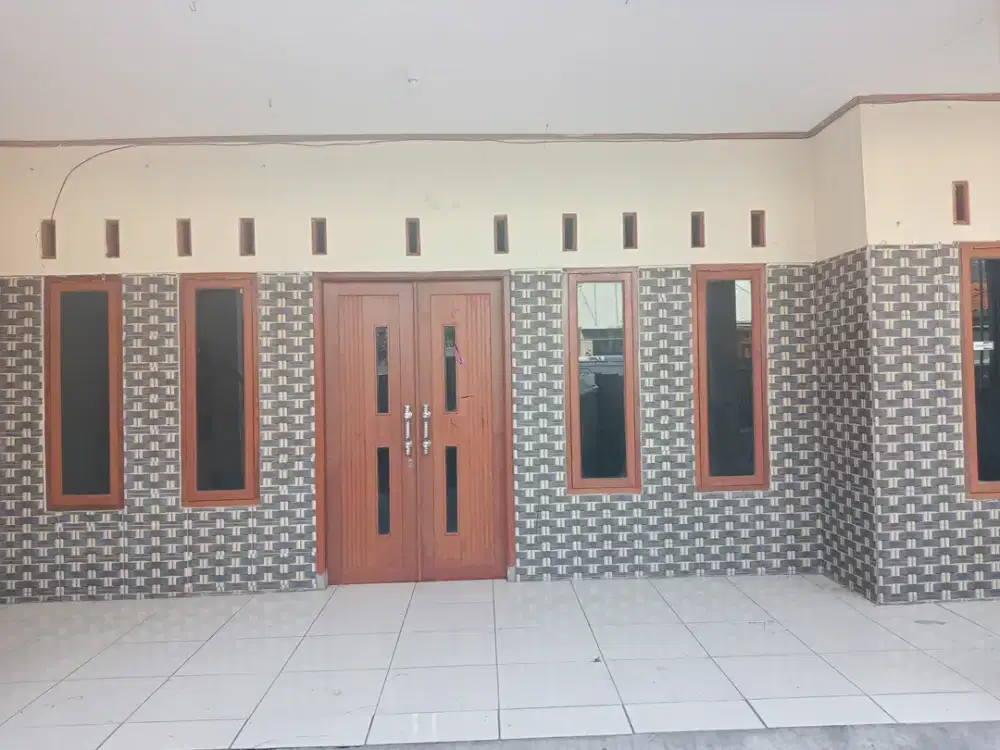 Rumah Pusat Kota Sayap Pungkur / Moh Ramdhan