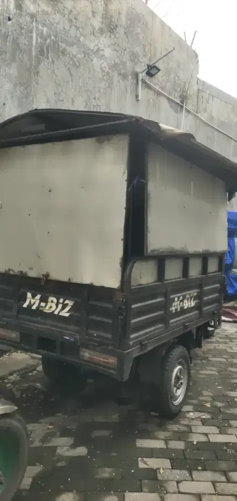 Tossa M-BiZ  minus pemakaian