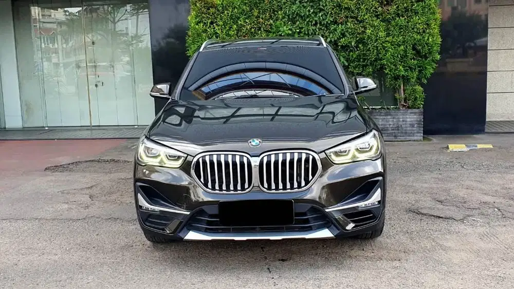 BMW X1 sDrive 1.8i Xline Facelift AT 2020 Coklat Panoramic km.23rb