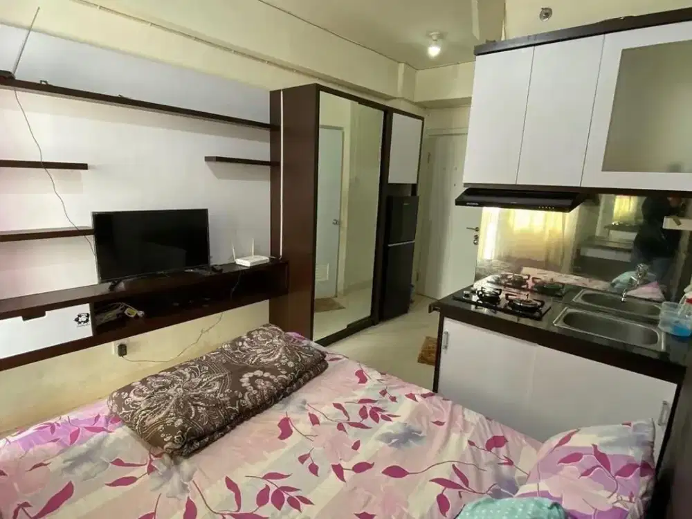 The green pramuka city apartement studio