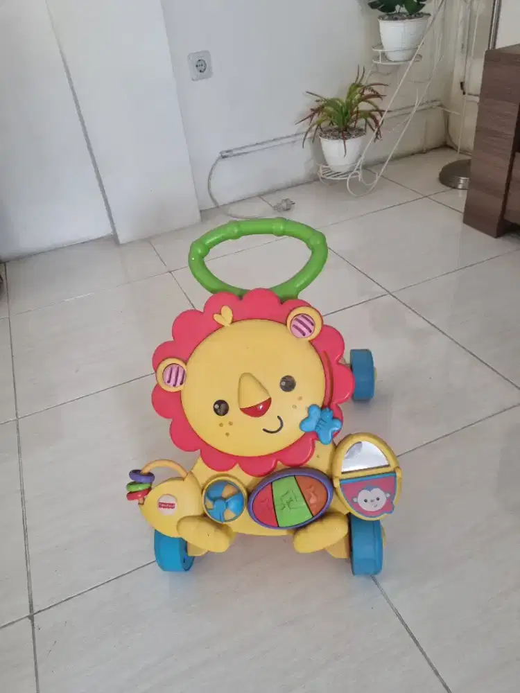 Preloved baby walker Fisher Price