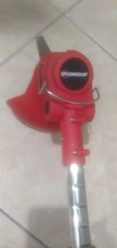 Alat potong rumput portabel