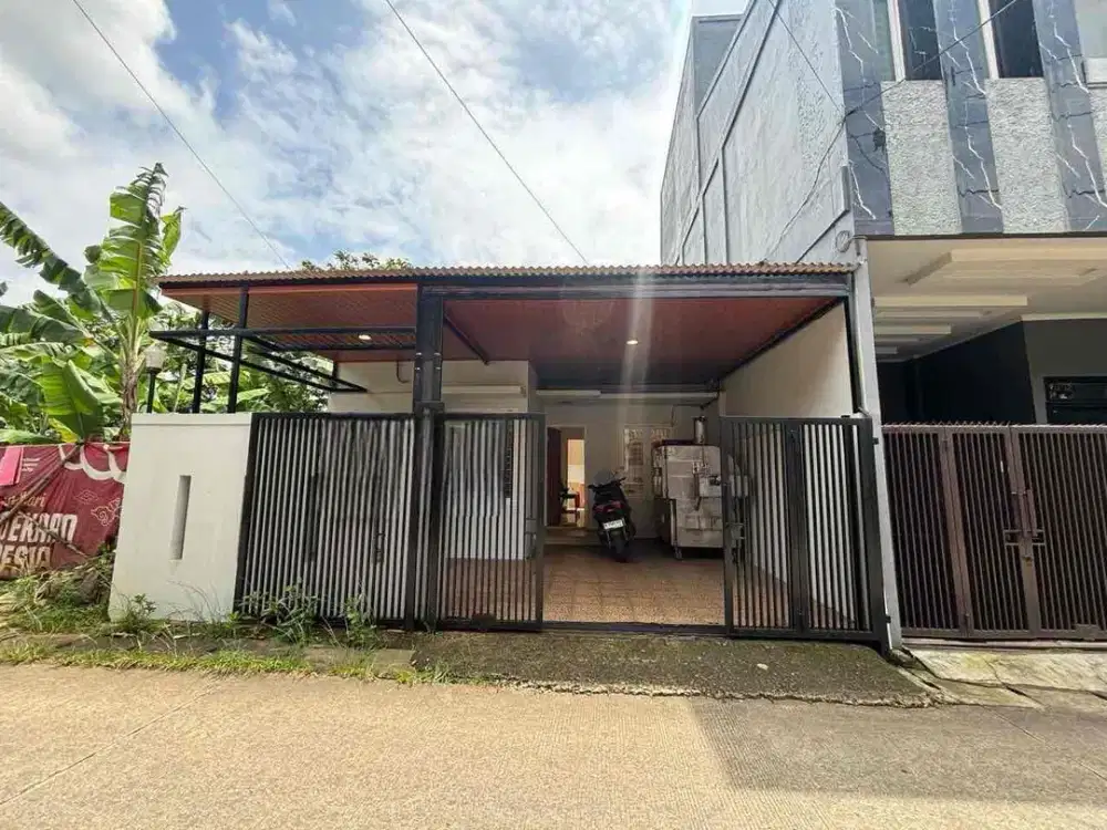 Rumah Simple Banget Tapi lokasi Strategis nempel pintu Tol Limo.