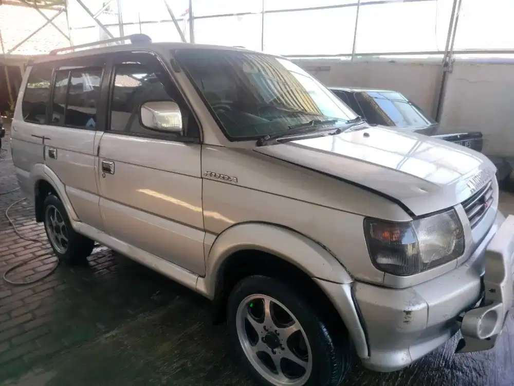 Mitsubishi kuda bensin super exceed th2000