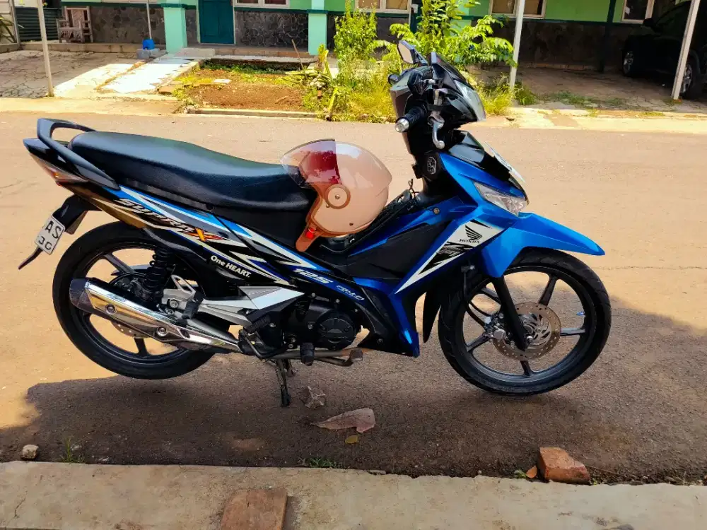 KM low 20.000 investasi jangka panjang supra injeksi 2015