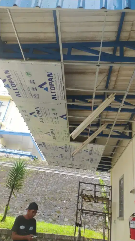 Tukang pasad acp eksterior