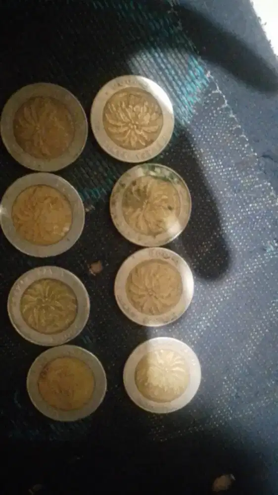 Uang koin 1000 kelapa sawit