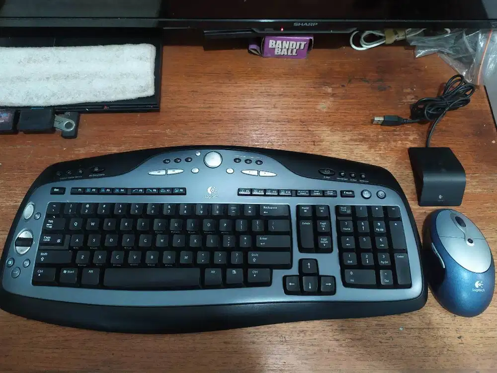 Logitech Cordless Desktop Keyboard LX700 Mouse Optical Click Plus USB