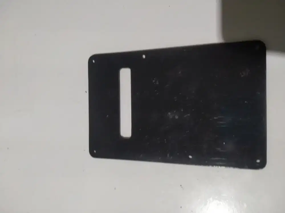 Penutup belakang gitar elektrik