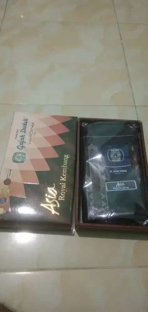 Sarung gajah duduk asia kembang baru