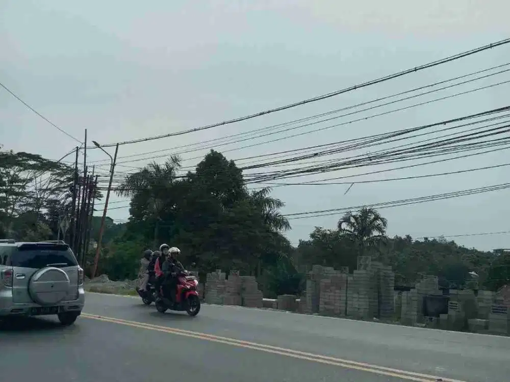 Tanah 5,6 H dijual cepat jl Soekarno Hatta km 7