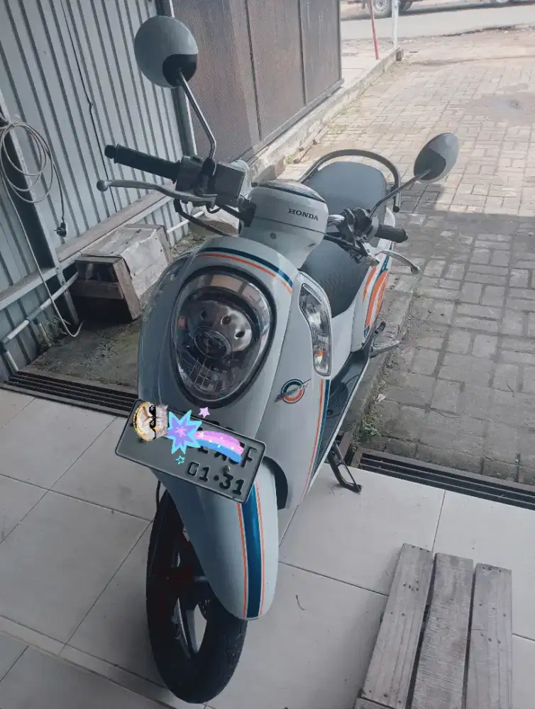 Honda scoopy idling stop 2016