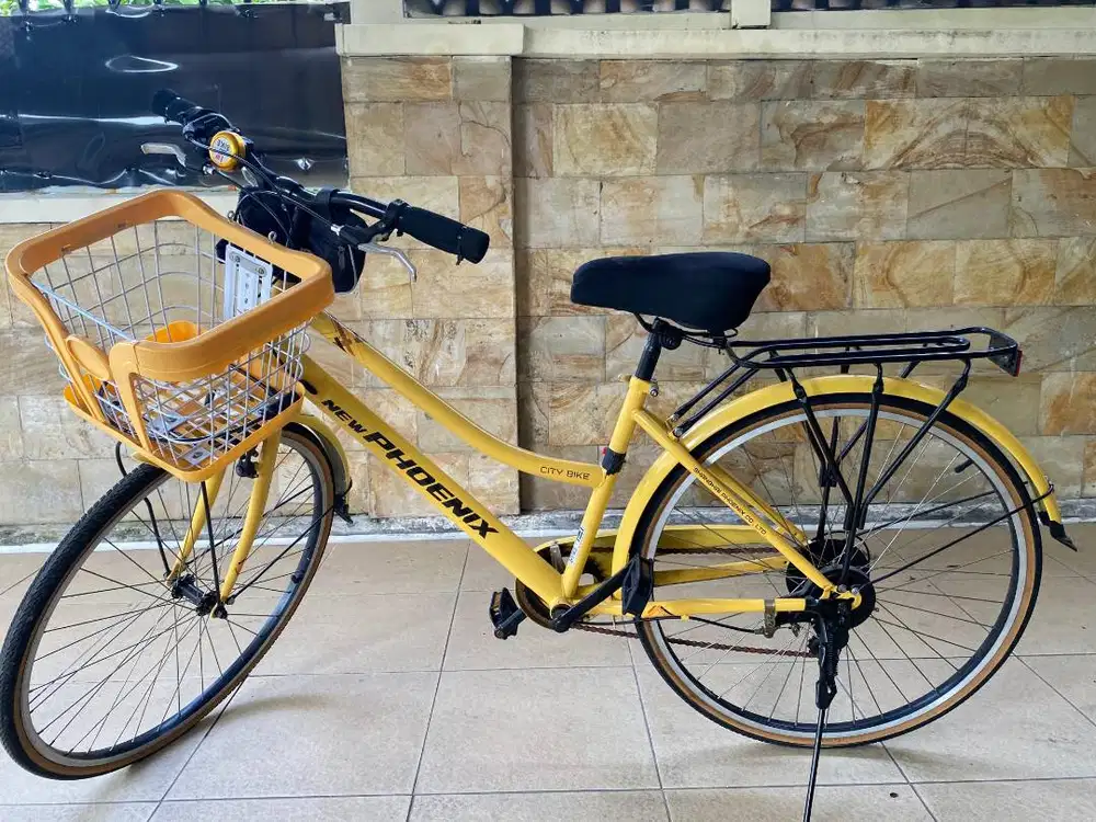 Sepeda Polygon kuning keranjang