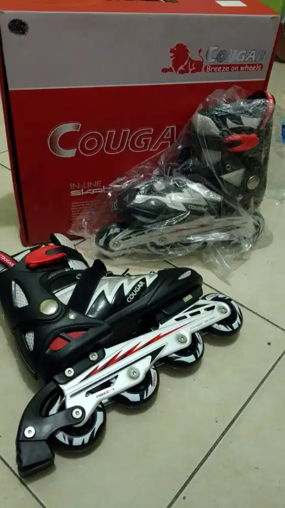 sepatu roda merk cougart