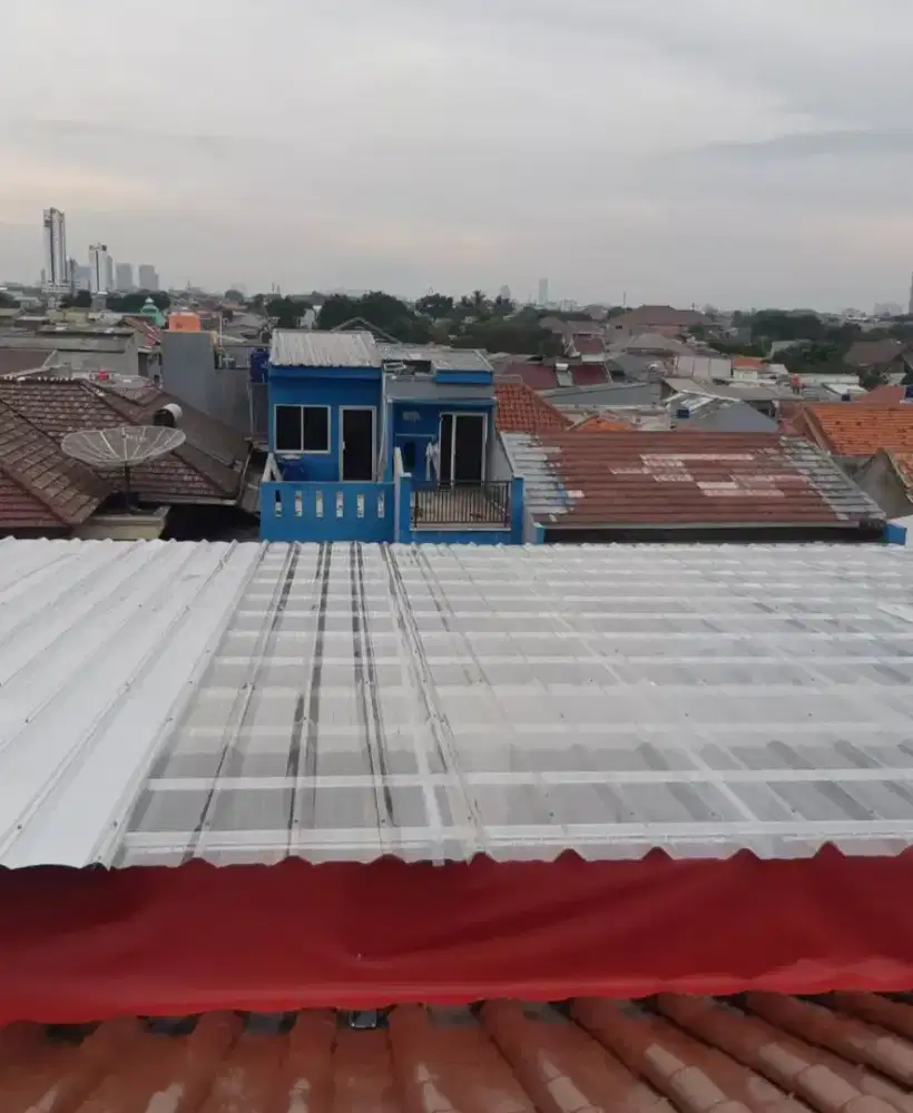 Pasang kanopi baja ringan atap transparan