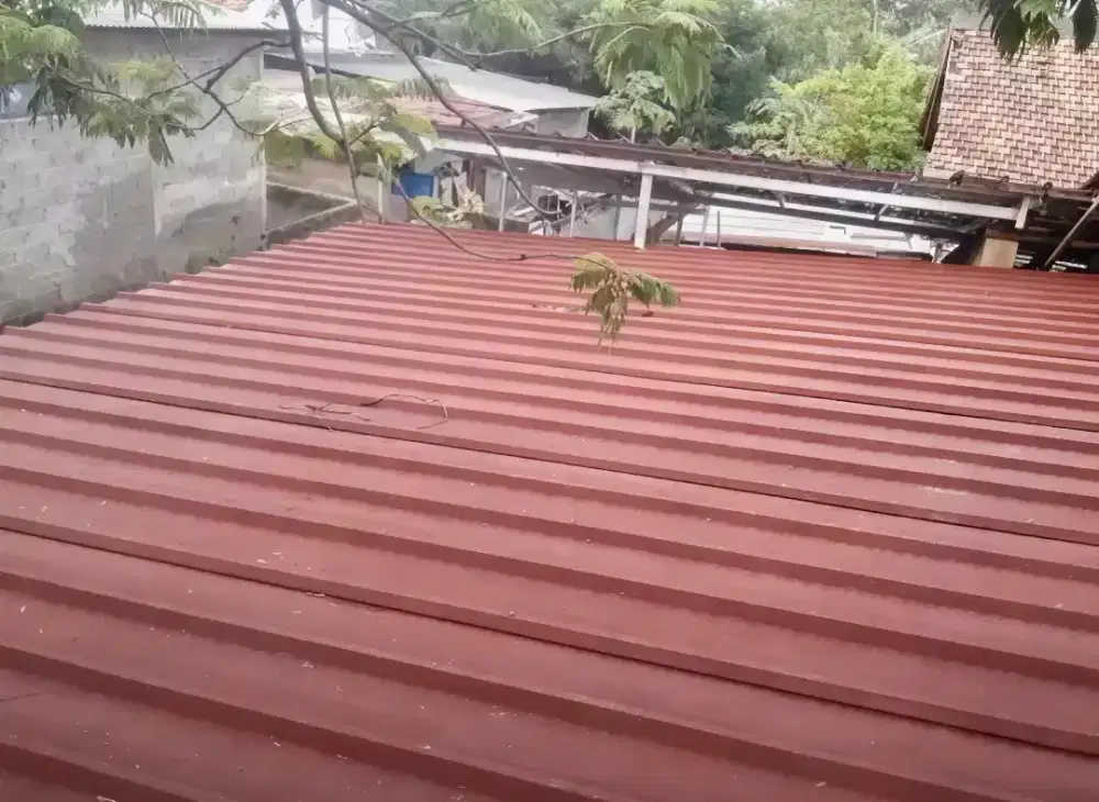 Pasang baja ringan atap spandek pasir