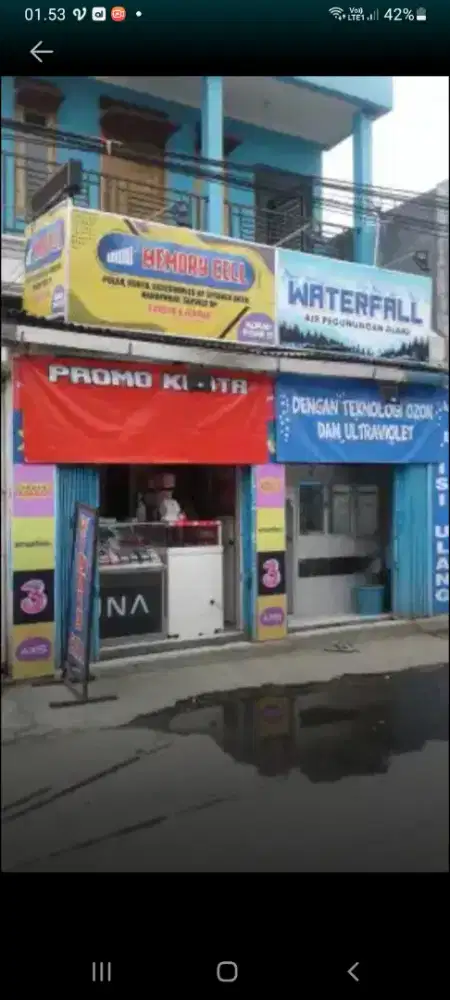 Konter pulsa dan isi ulang galon