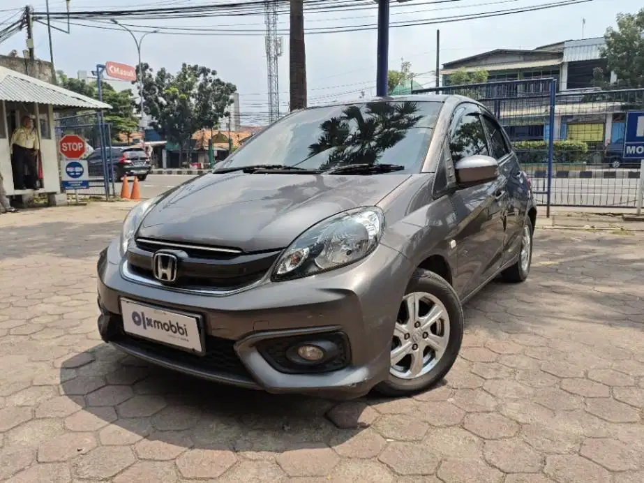 DP Murah Honda Brio Satya  1.2 E Bensin-AT 2016 Abu-Abu