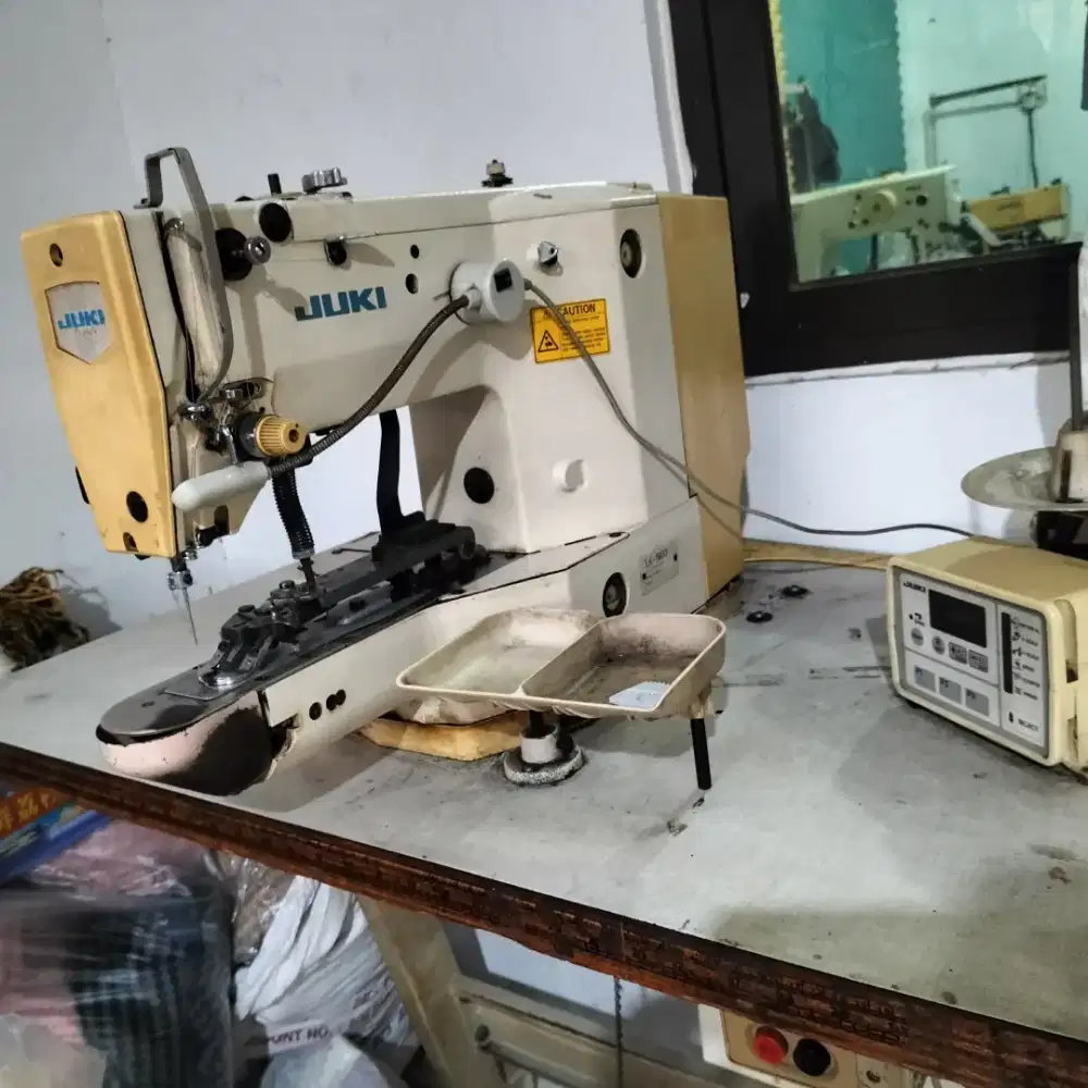 Mesin Jahit Pasang Kancing Juki