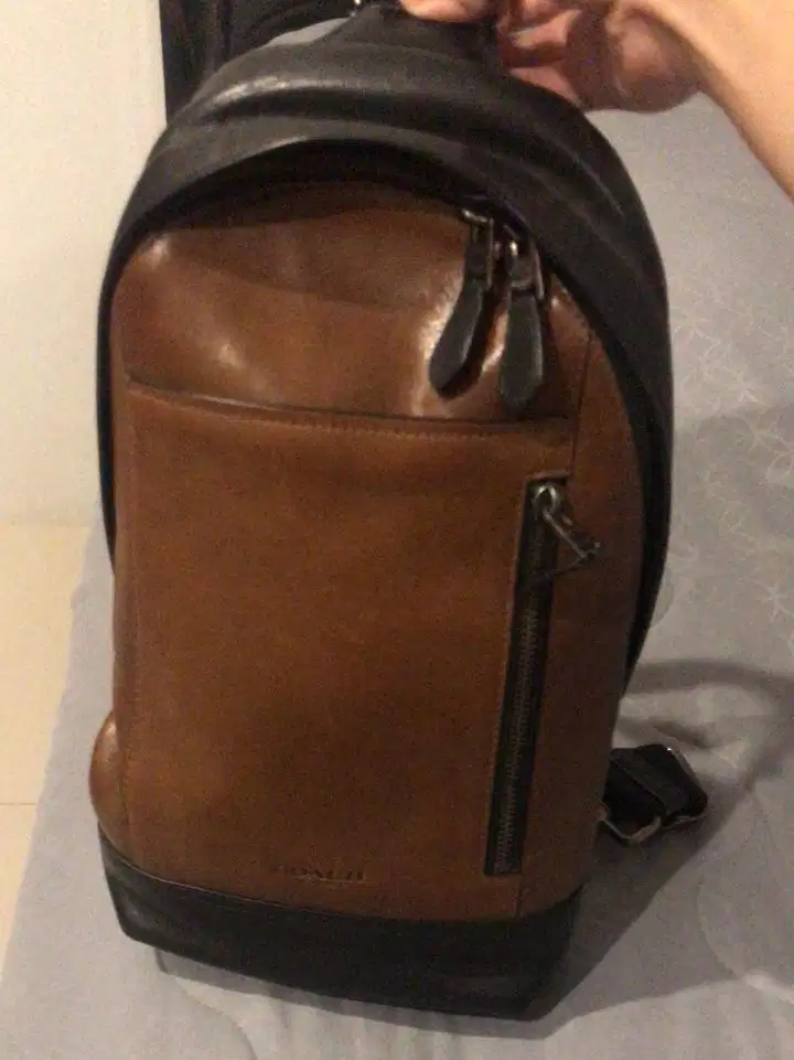 Coach brown sling bag