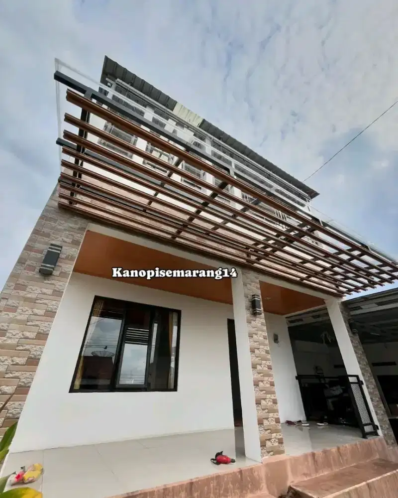 Kanopi solarflat dan.polycarbonate rangka baja ringan