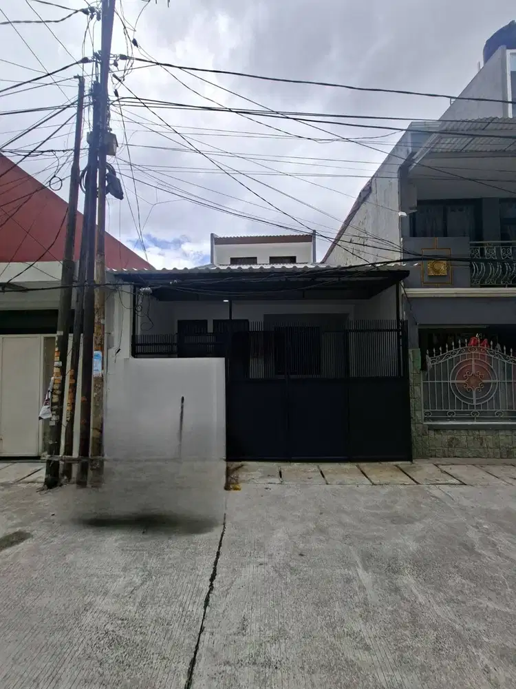 Rumah 1 1/2 lantai baru renov tinggal pakai daerah grogol jalan hemat