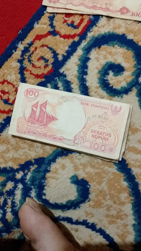 Uang kuno 100 Rupiah pinisi
