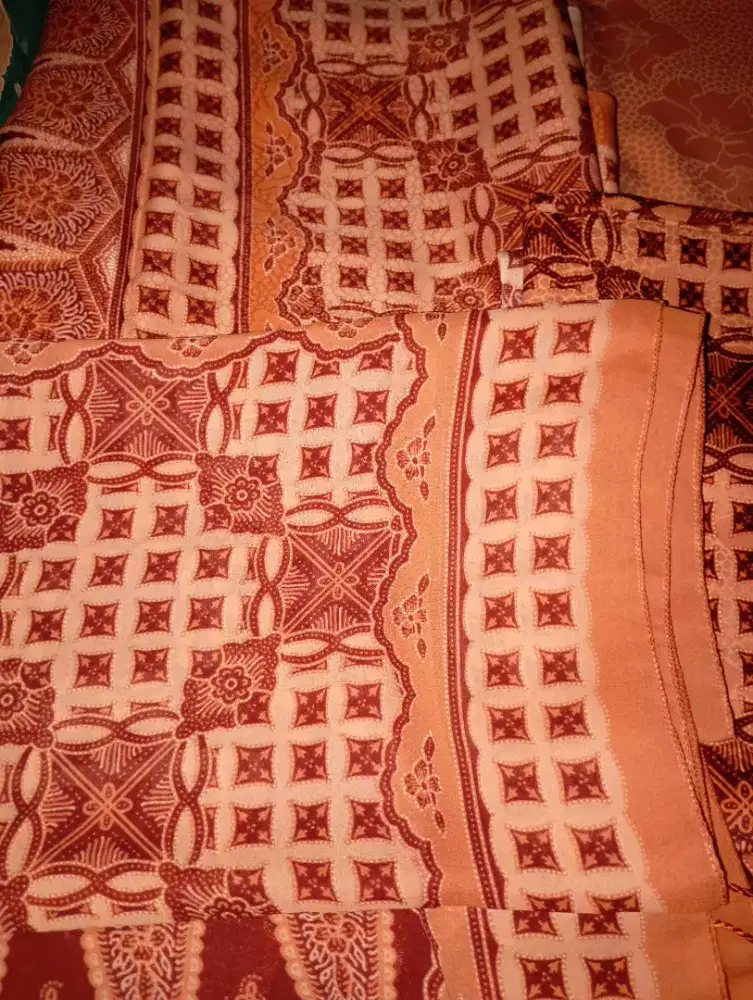 Kain sarimbit design sutra timbul