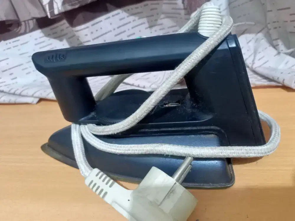 Setrika bekas pakai normal