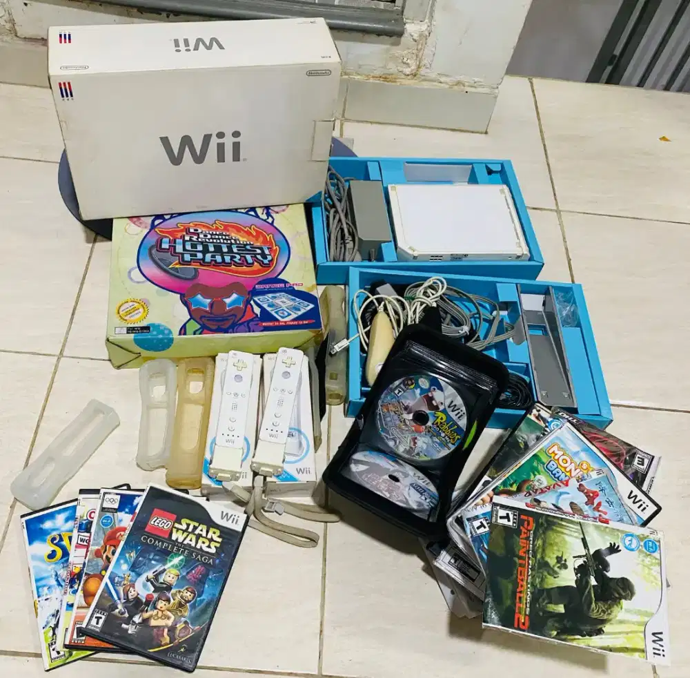 Nitendo wii + dance pad + 2 extra contoler + game ratusan