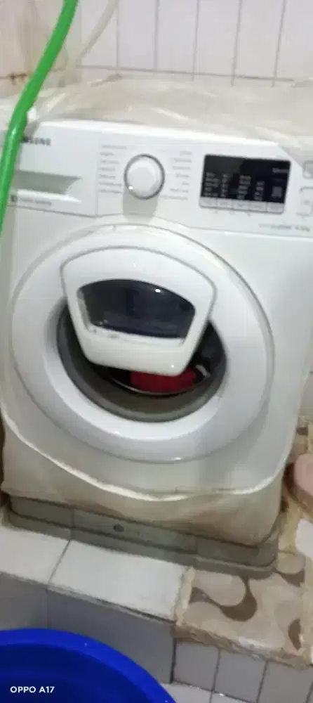 Mesin cuci front loading matot