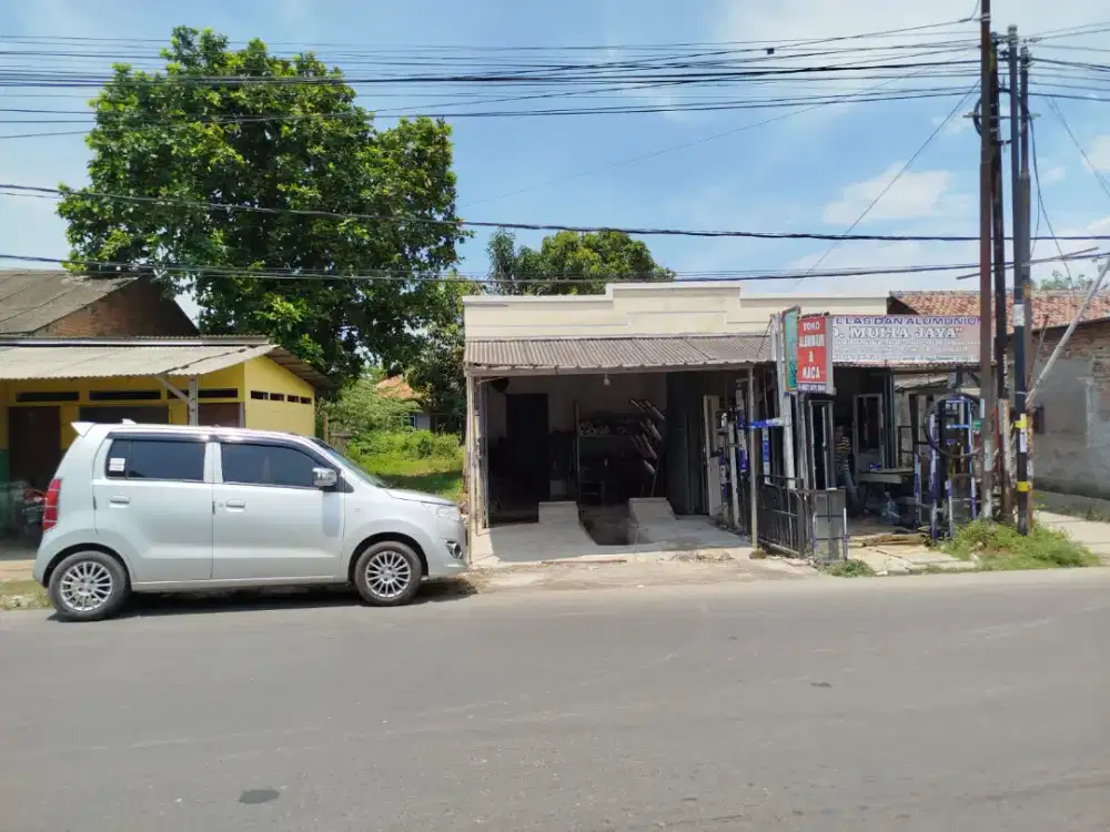 Jual tanah berikut rumah fan 3 kios