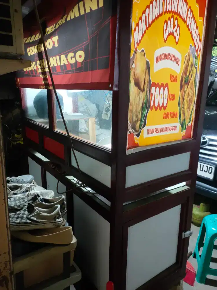 Gerobak jualan bahan kayu kamper