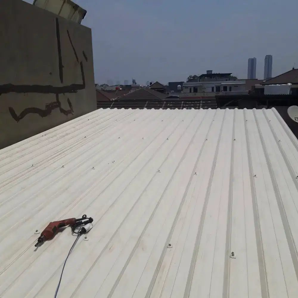 Pasang baja ringan atap alderon