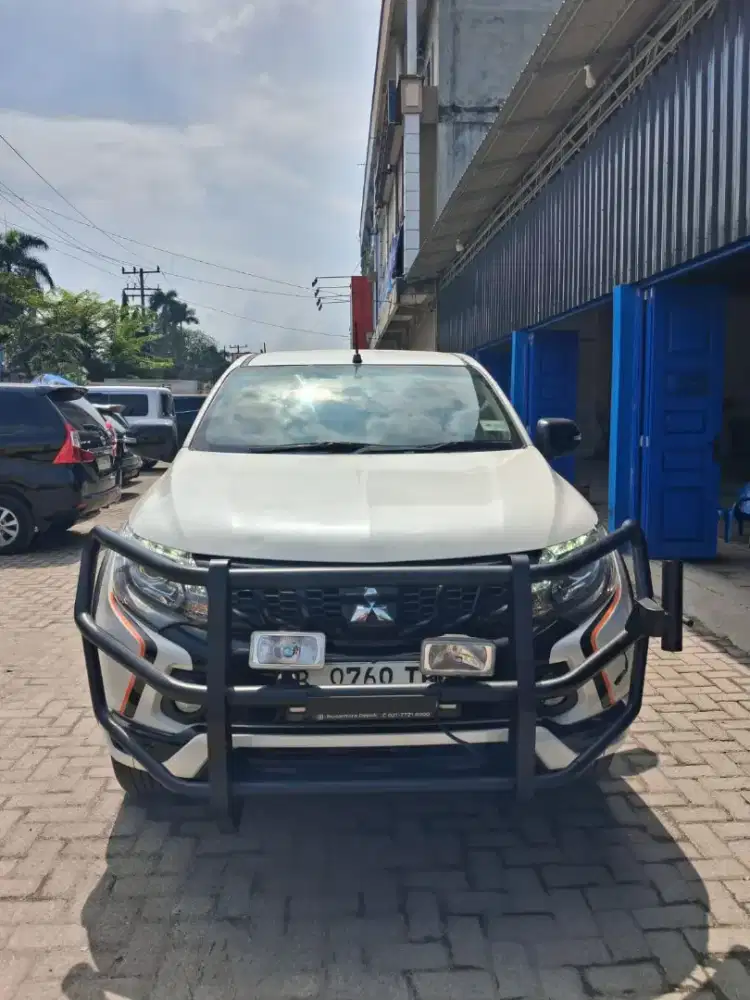 Triton Athlete Manual 2019 Putih