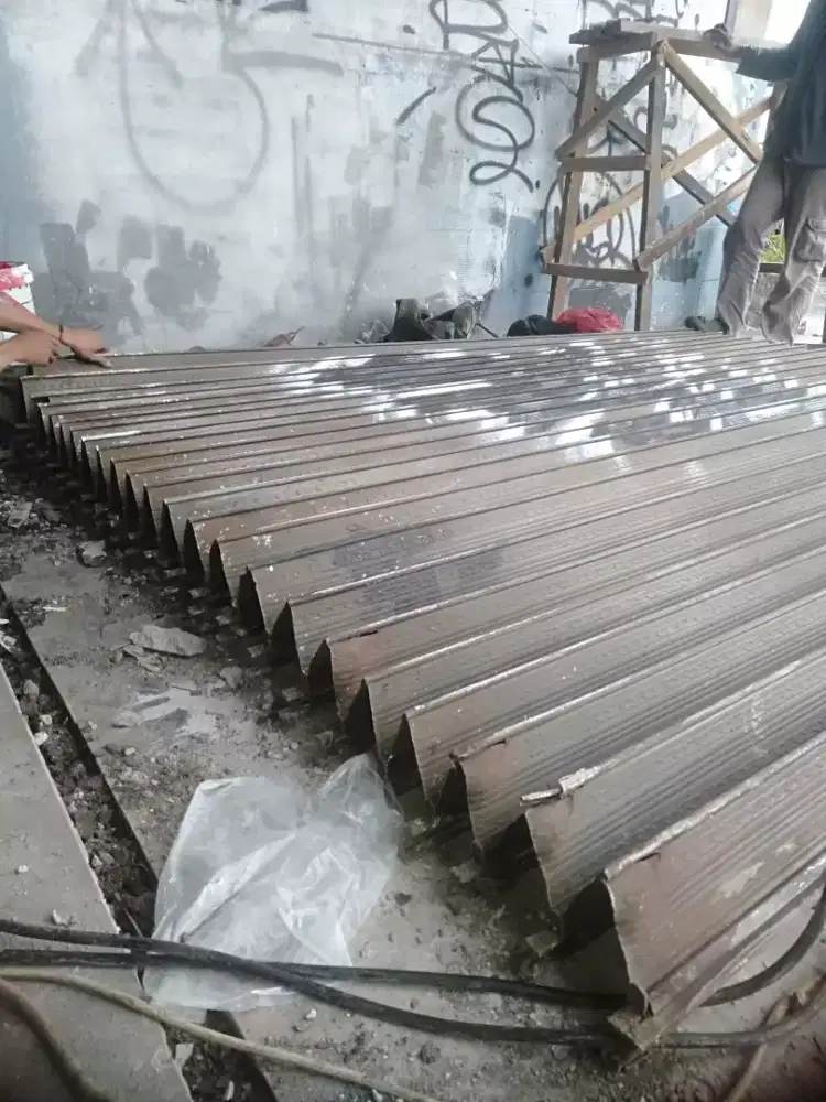 Tukang service rolling door folding gate murah