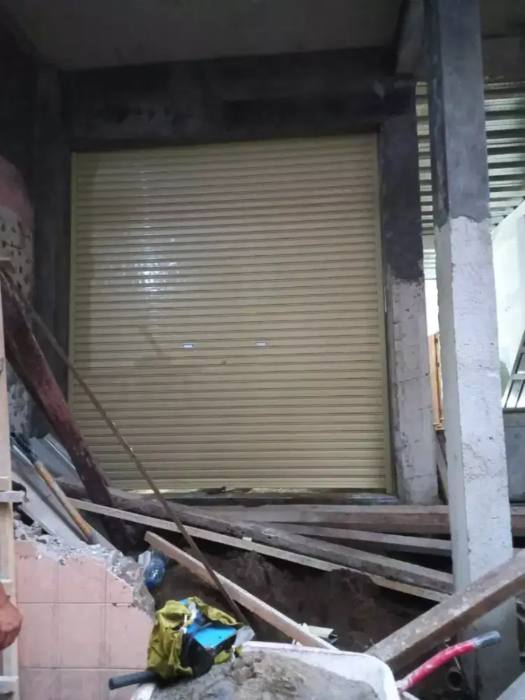 Tukang service rolling door murah