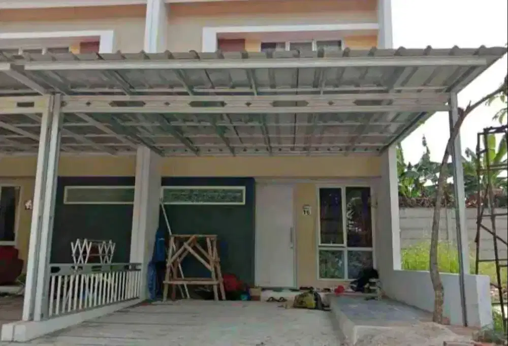 Pasang rangka atap baja ringan spandek