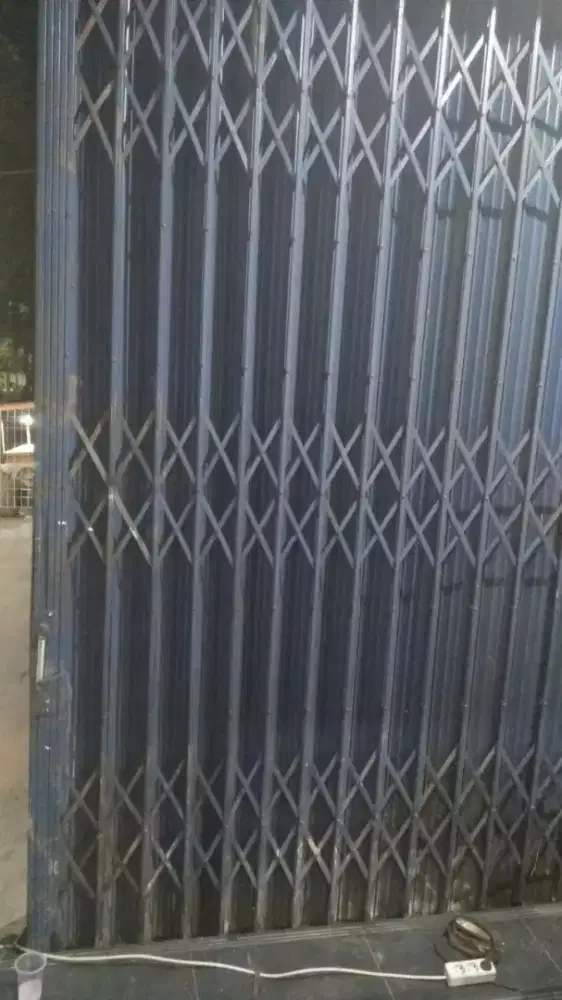 Tukang service rolling door murah