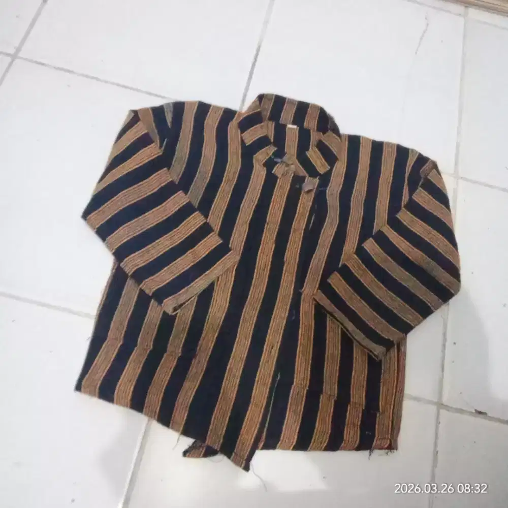 50.000 second baju adat