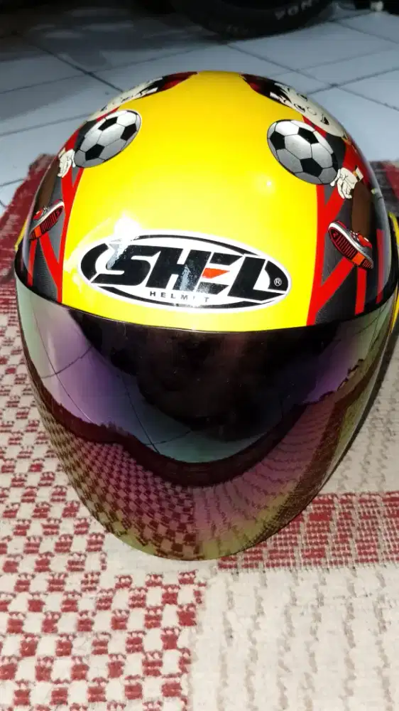Helm anak merk shel