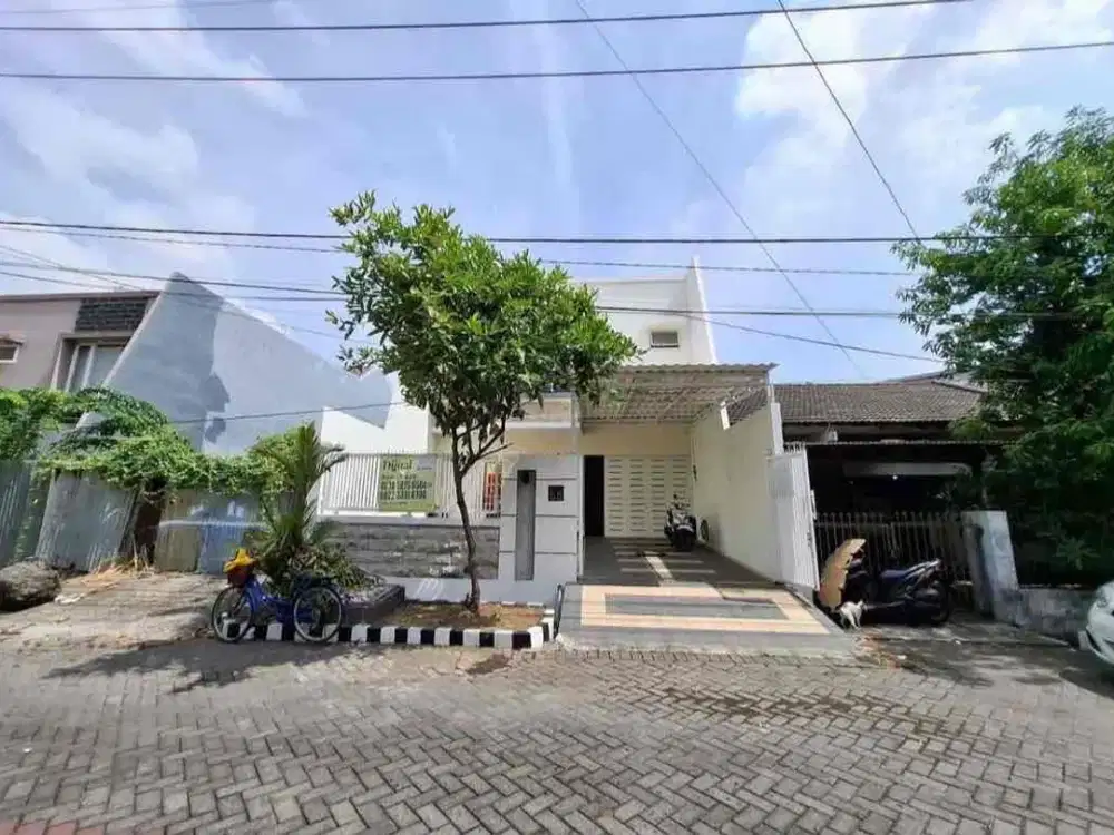 Siap Huni dijual rumah kutisari indah utara row jalan 3 mobil longgar